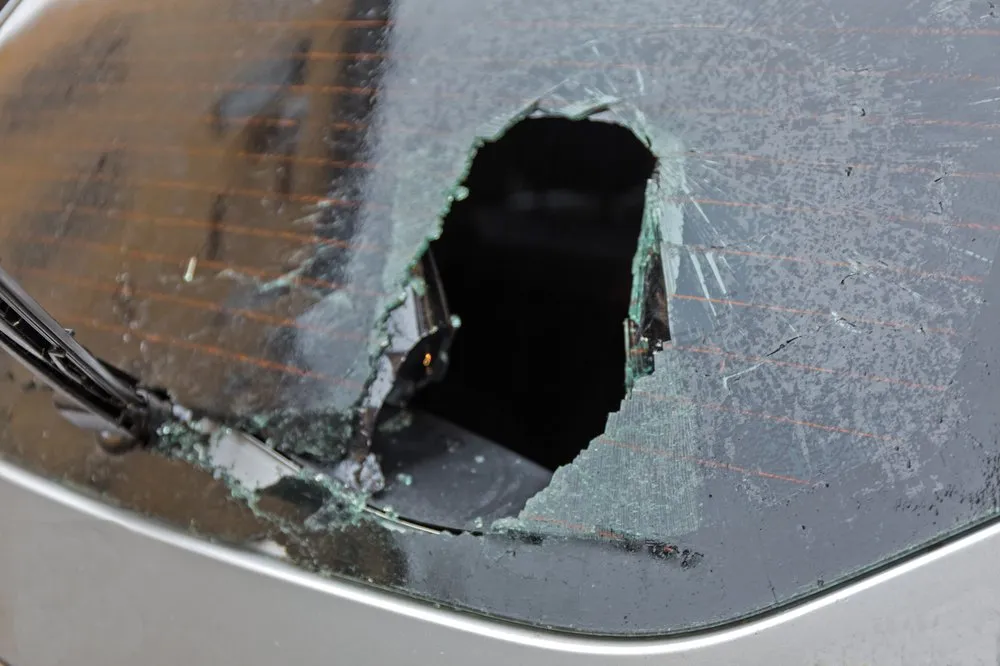Rear car window with defroster lines being replaced in Las Vegas
